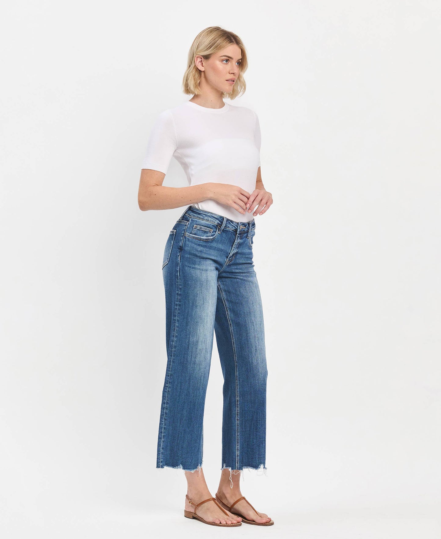 Mid Rise Medium Dark Wash Raw Hem Wide Jeans